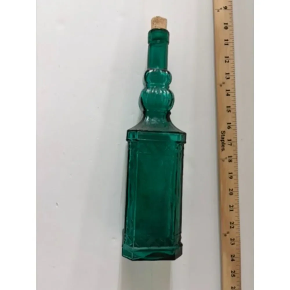 vtg emerald green glass decanter bottle with embossed sides and cork stopper